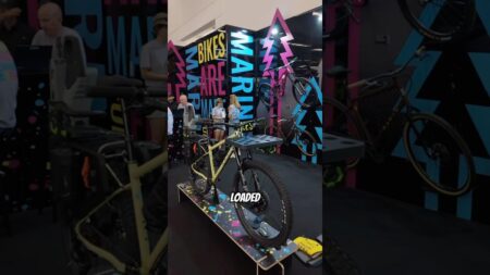 Discover the Ultimate Trail Builder Bike with Built-In Chainsaw Storage and Shared Battery Power!